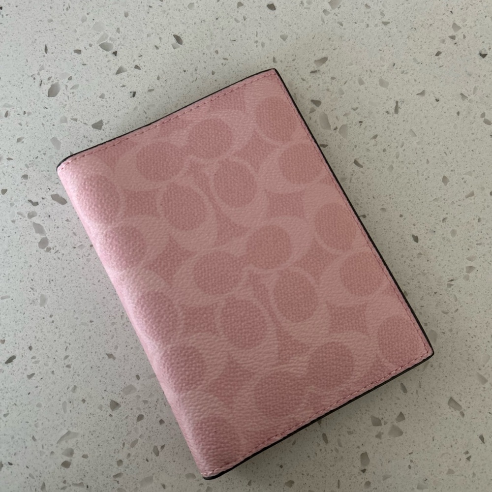 coach powder pink passport holder